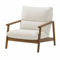 Sillón con estructura de madera y tapizado en tela crema